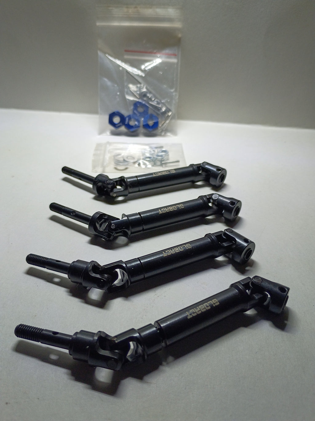 GLOBACT - Upgraded 1144 Steel CVD Drive Shafts Set of 4 with Blue Aluminum Hex Hubs & Hardware for Traxxas #6851 #6852 Axle Replacement